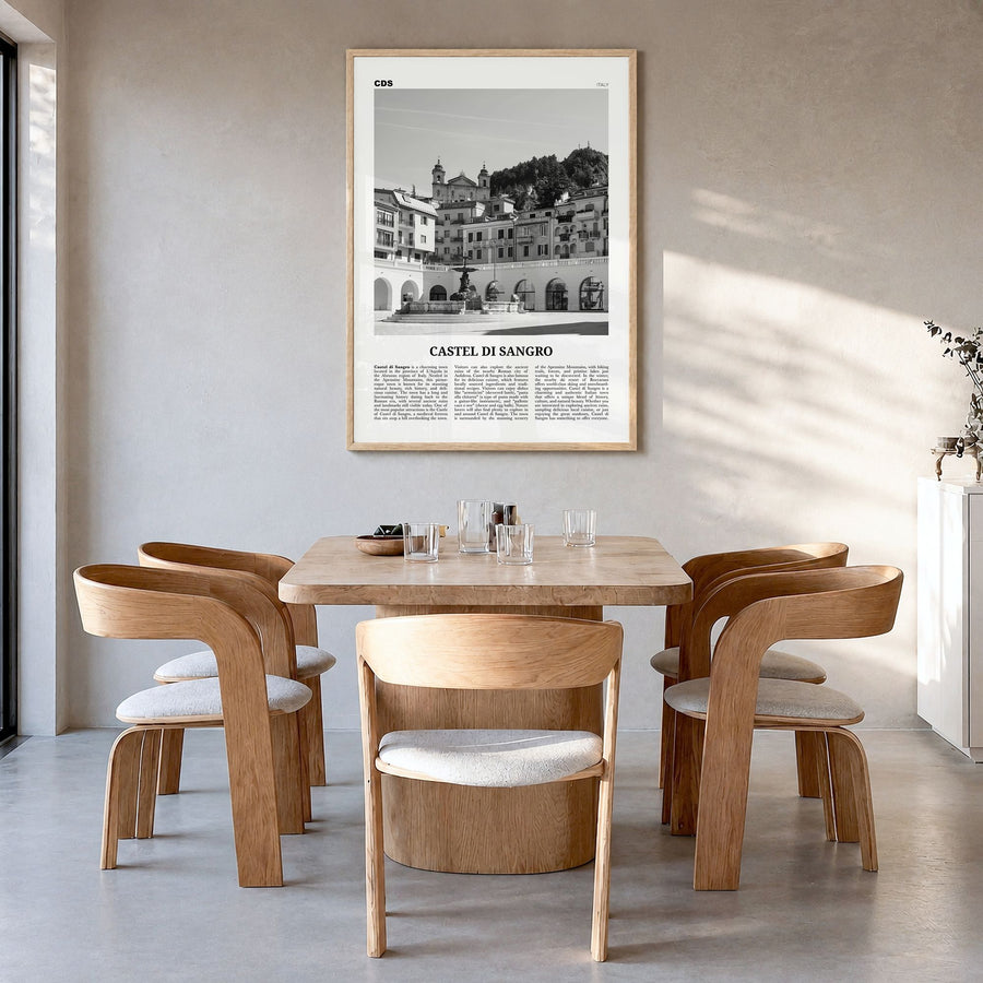Castel di Sangro Newspaper Poster in a natural wood frame, hanging in a dining room