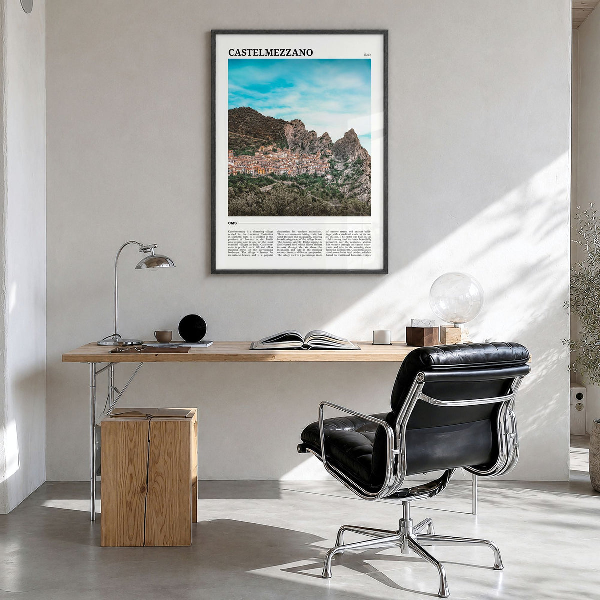 Castelmezzano Travel Poster in a black wood frame, hanging in a bright home office
