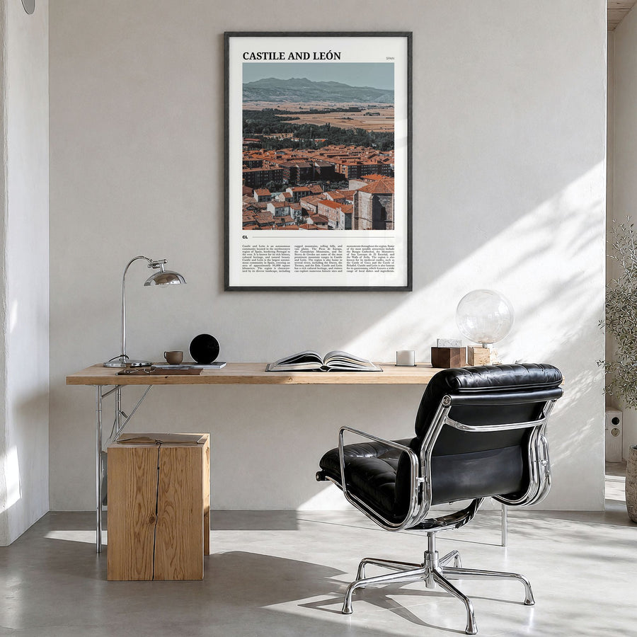 Castile and León Travel Poster in a black wood frame, hanging in a bright home office