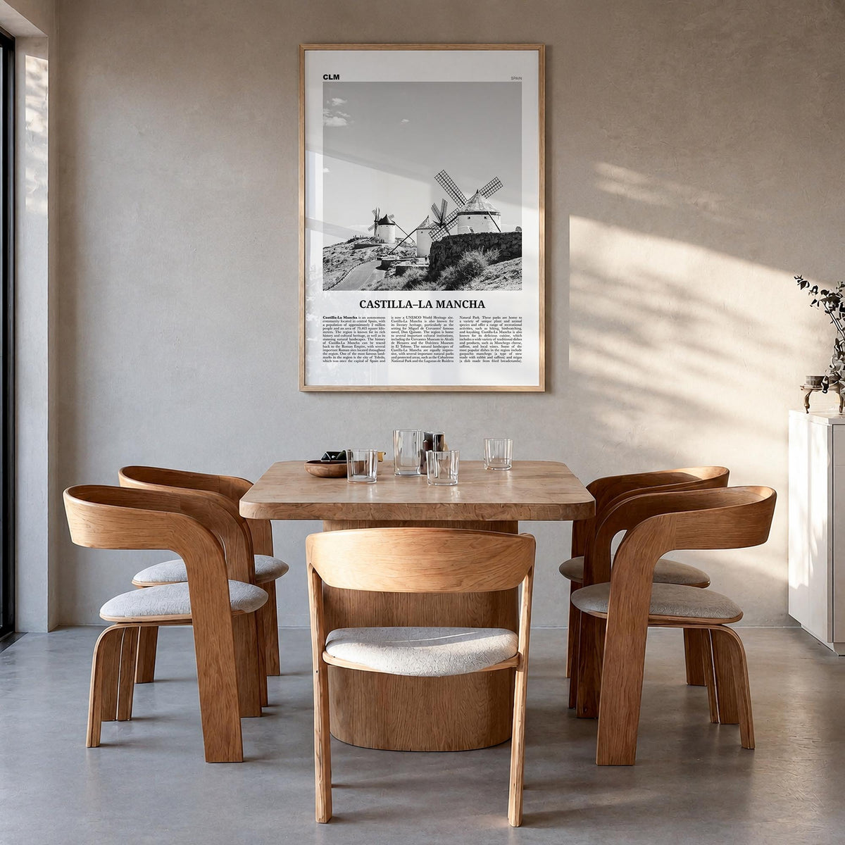 Castilla-La Mancha black & white newspaper poster of Spain – vertical wall art in natural wood frame, hanging on wall