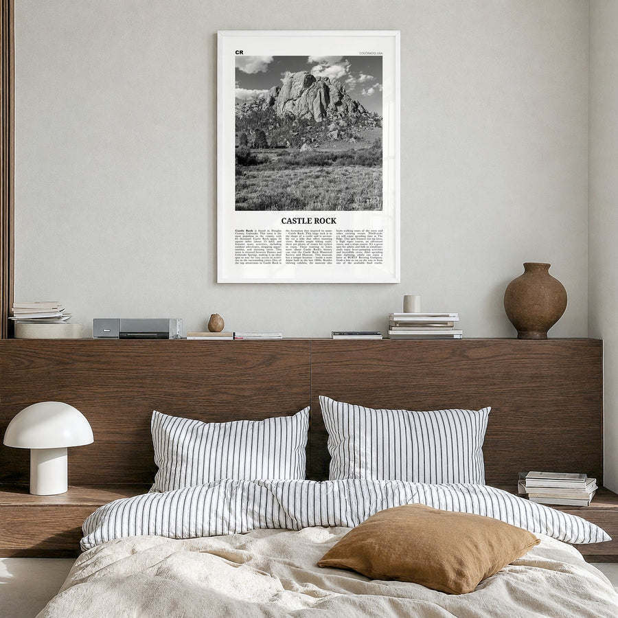 Castle Rock Newspaper Poster in a white wood frame, hanging in a bedroom