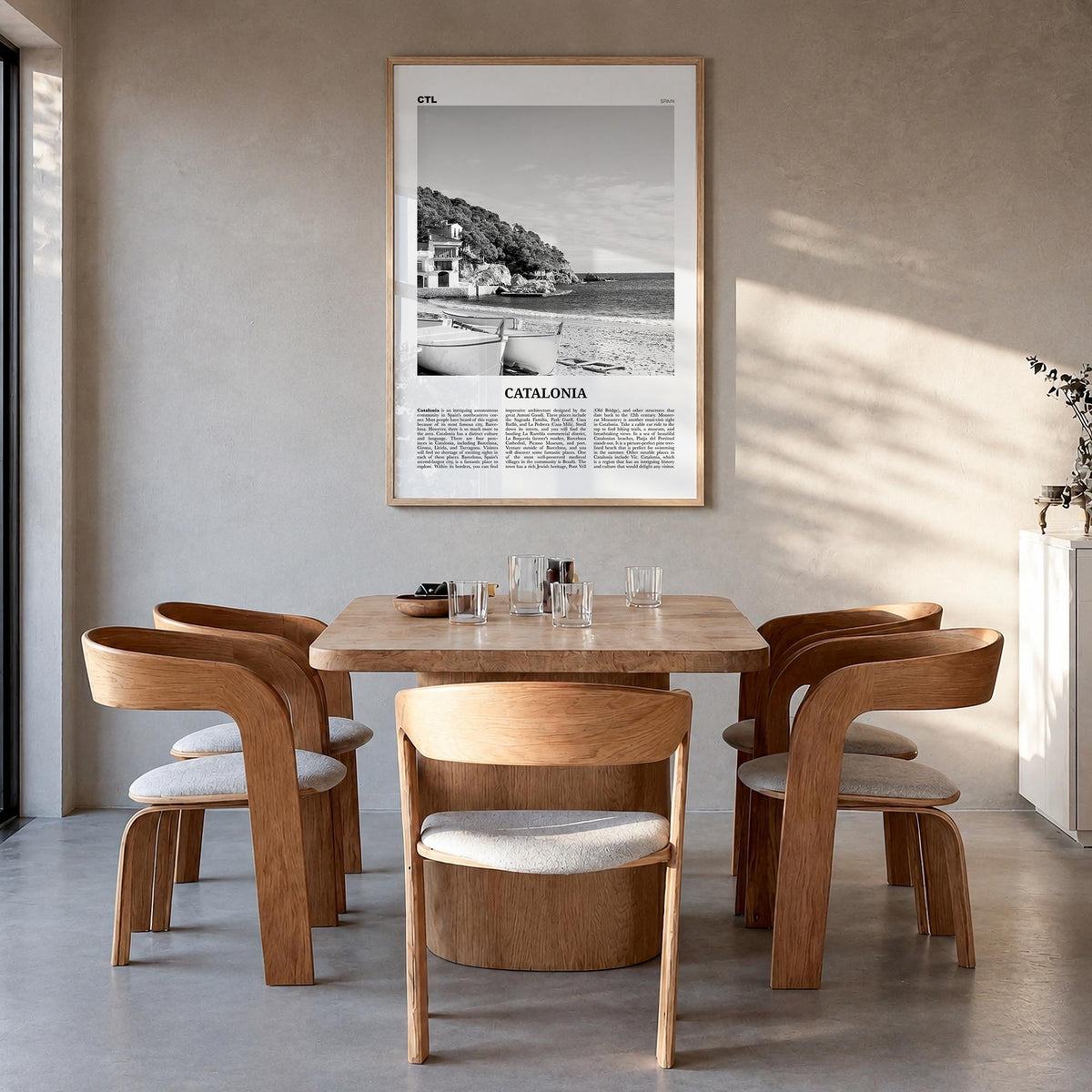 Catalonia black & white newspaper poster of Spain – vertical wall art in natural wood frame, hanging on wall