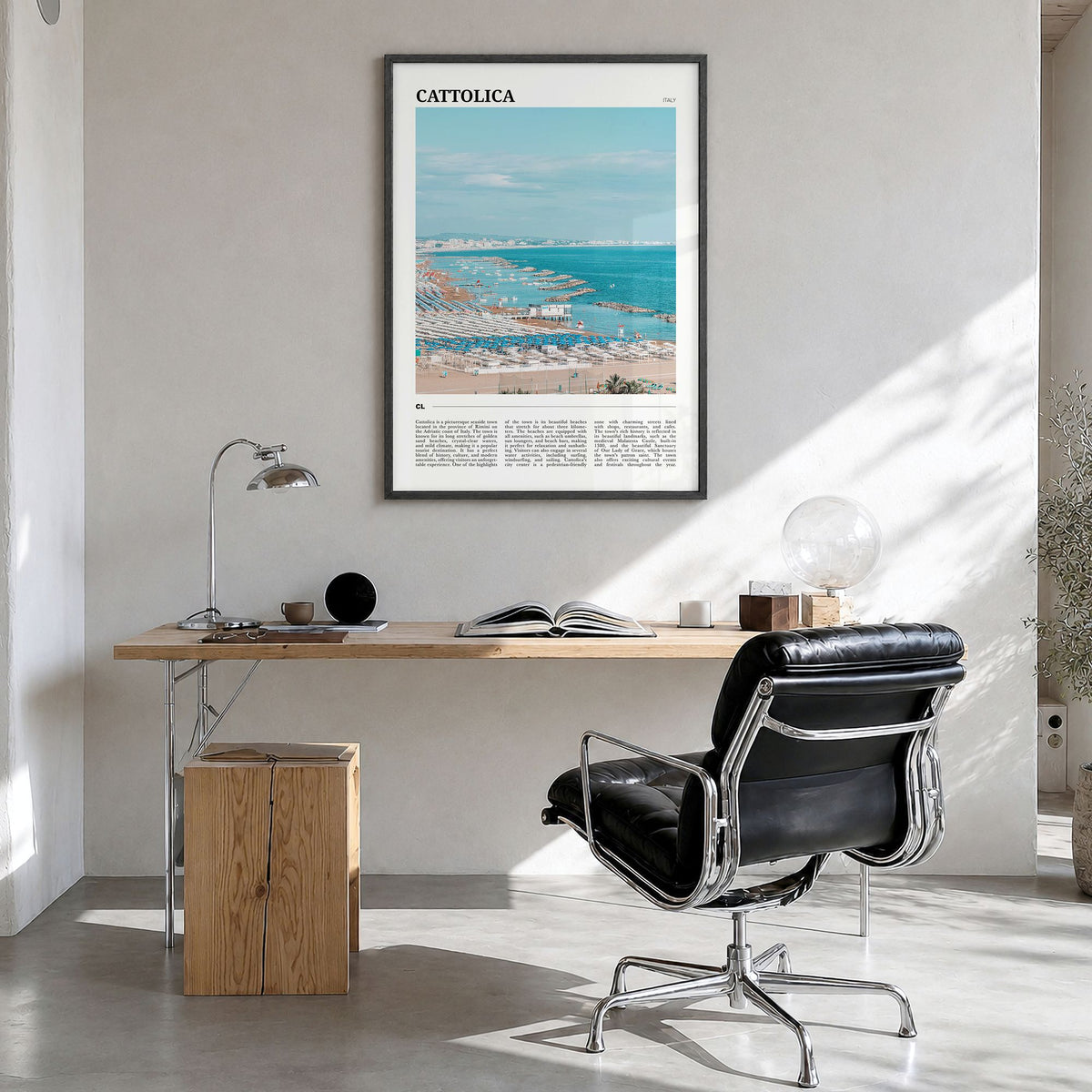 Cattolica Travel Poster in a black wood frame, hanging in a bright home office