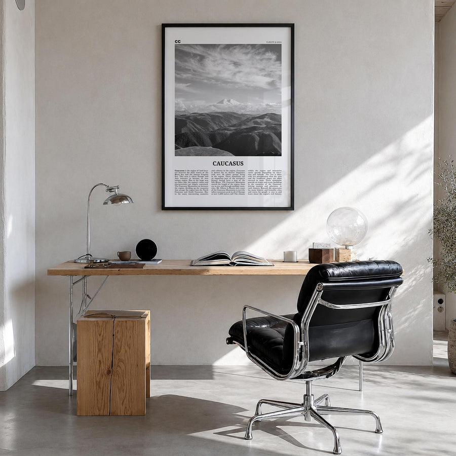 Caucasus Mountains black & white newspaper poster of Caucasus – vertical wall art in black wood frame, hanging on wall