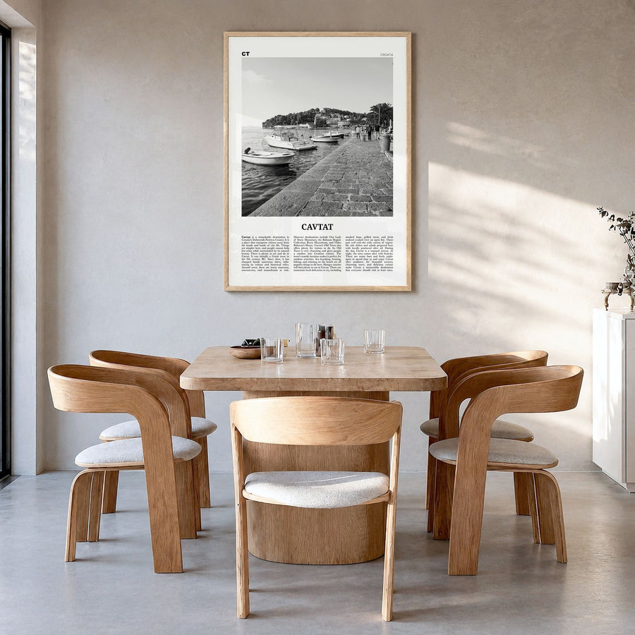 Cavtat Newspaper Poster in a natural wood frame, hanging in a dining room