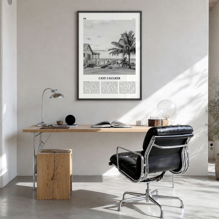 Caye Caulker Newspaper Poster in a black wood frame, hanging in a bright home office