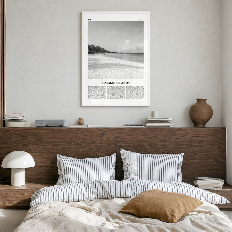 Cayman Islands Newspaper Poster in a white wood frame, hanging in a bedroom