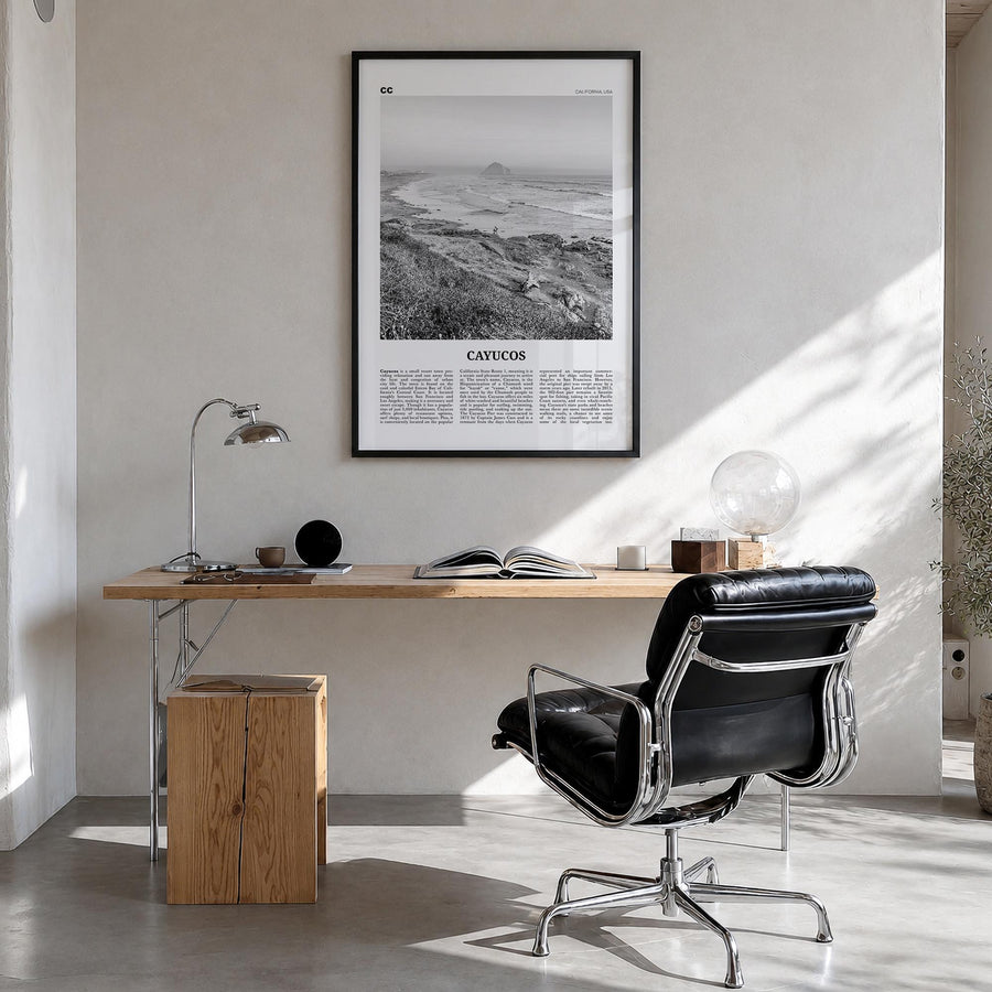Cayucos black & white newspaper poster of California, USA – vertical wall art in black wood frame, hanging on wall