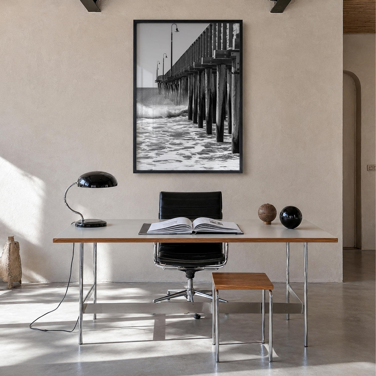 Cayucos black & white photo poster of California, USA – vertical wall art in black wood frame, hanging on wall