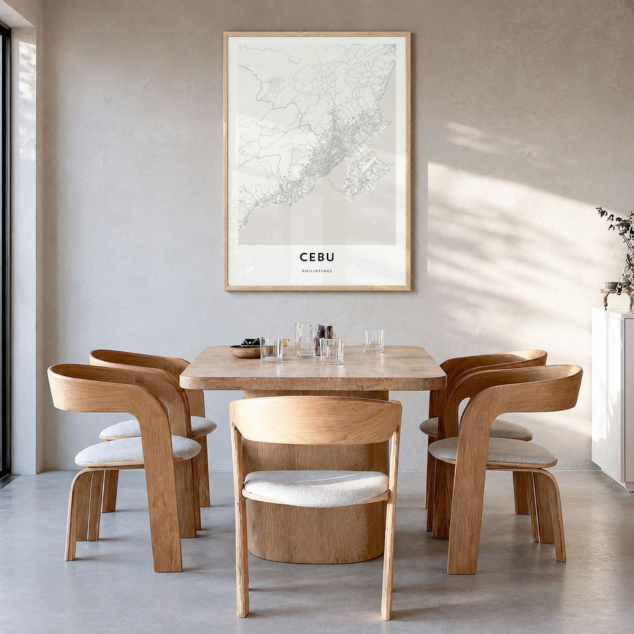 Cebu Map Poster in a natural wood frame, hanging in a dining room