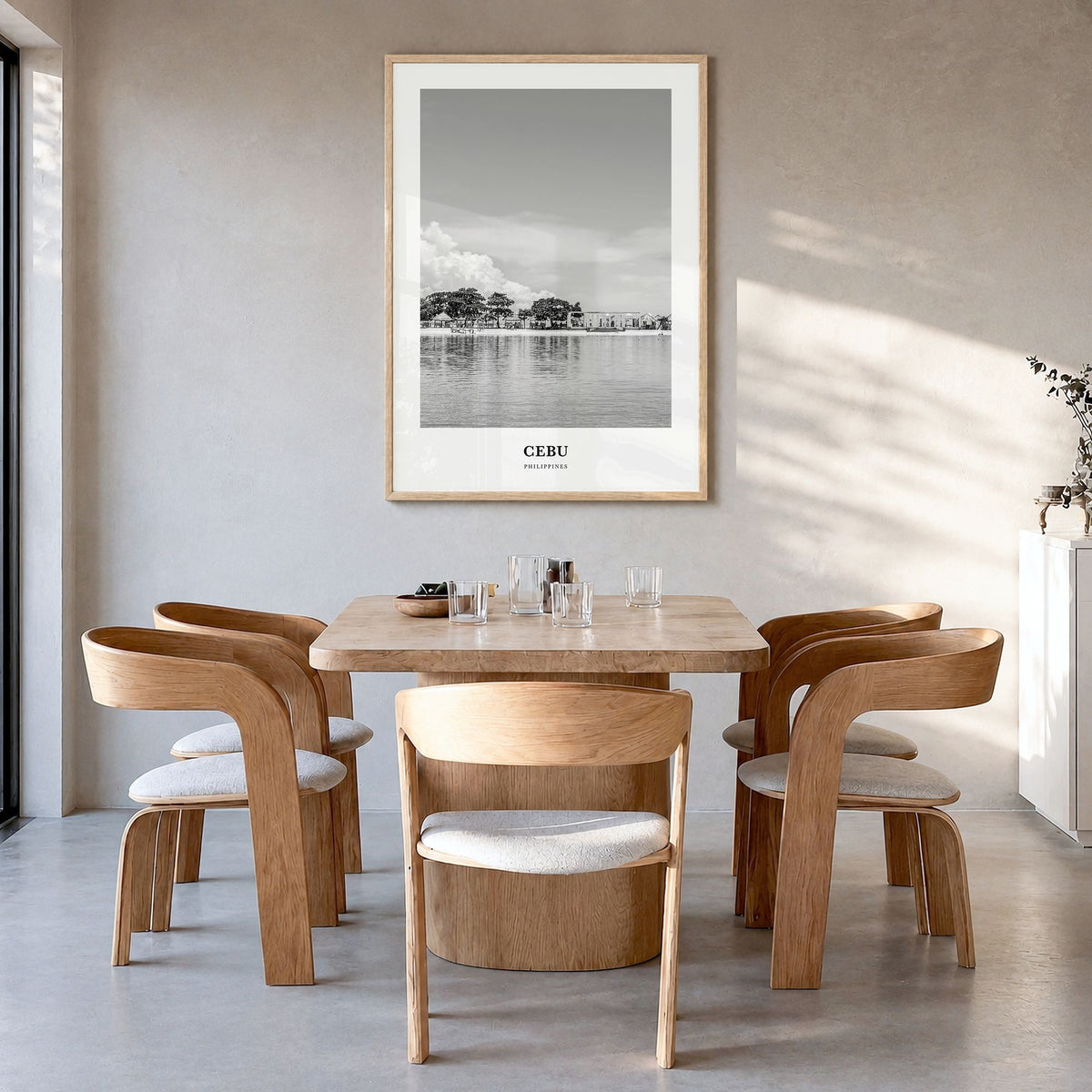 Cebu Classic No 1 Poster in a natural wood frame, hanging in a dining room