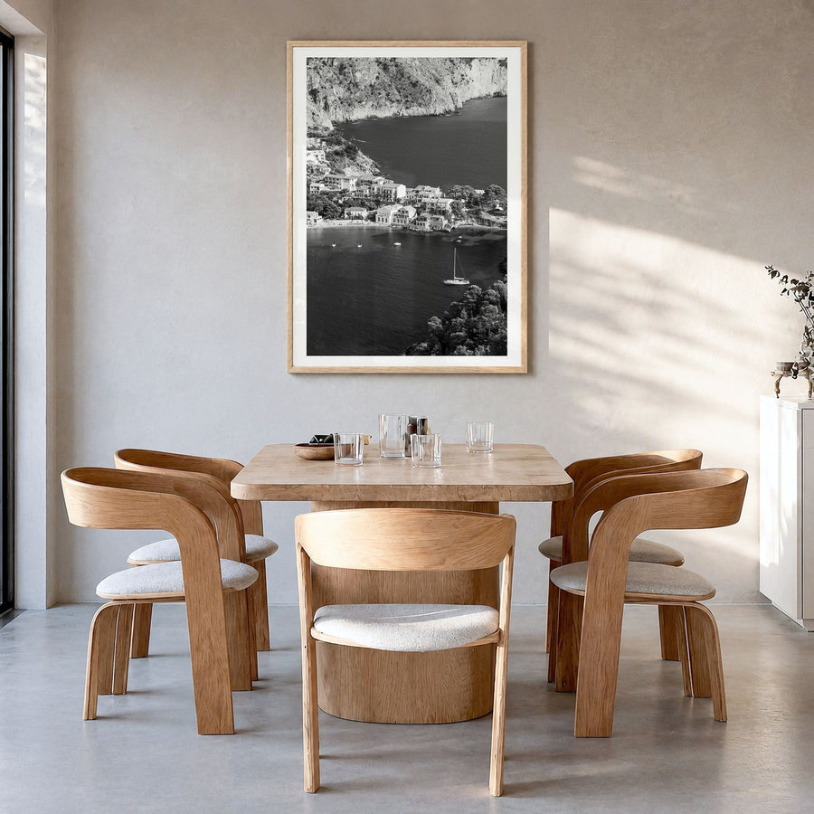 Cephalonia Photo Poster in a natural wood frame, hanging in a dining room, white border