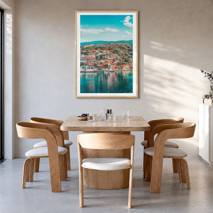 Cephalonia Photo Poster in a natural wood frame, hanging in a dining room, white border