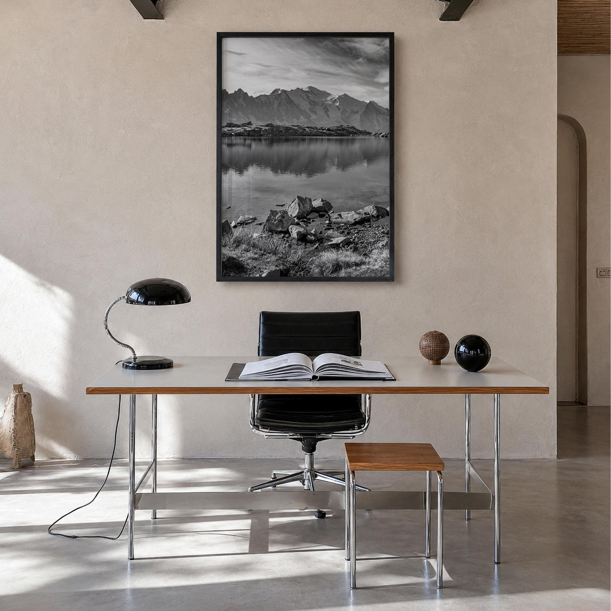 Chamonix black & white photo poster of France – vertical wall art in black wood frame, hanging on wall