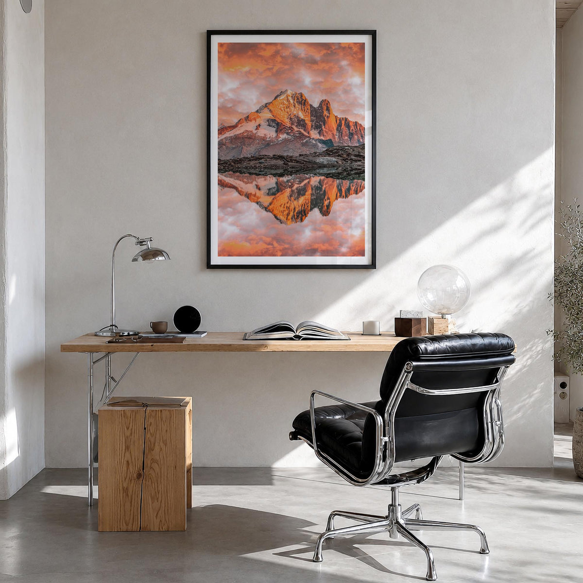 Chamonix colorful photo poster of France – vertical wall art in black wood frame with white border, hanging on wall
