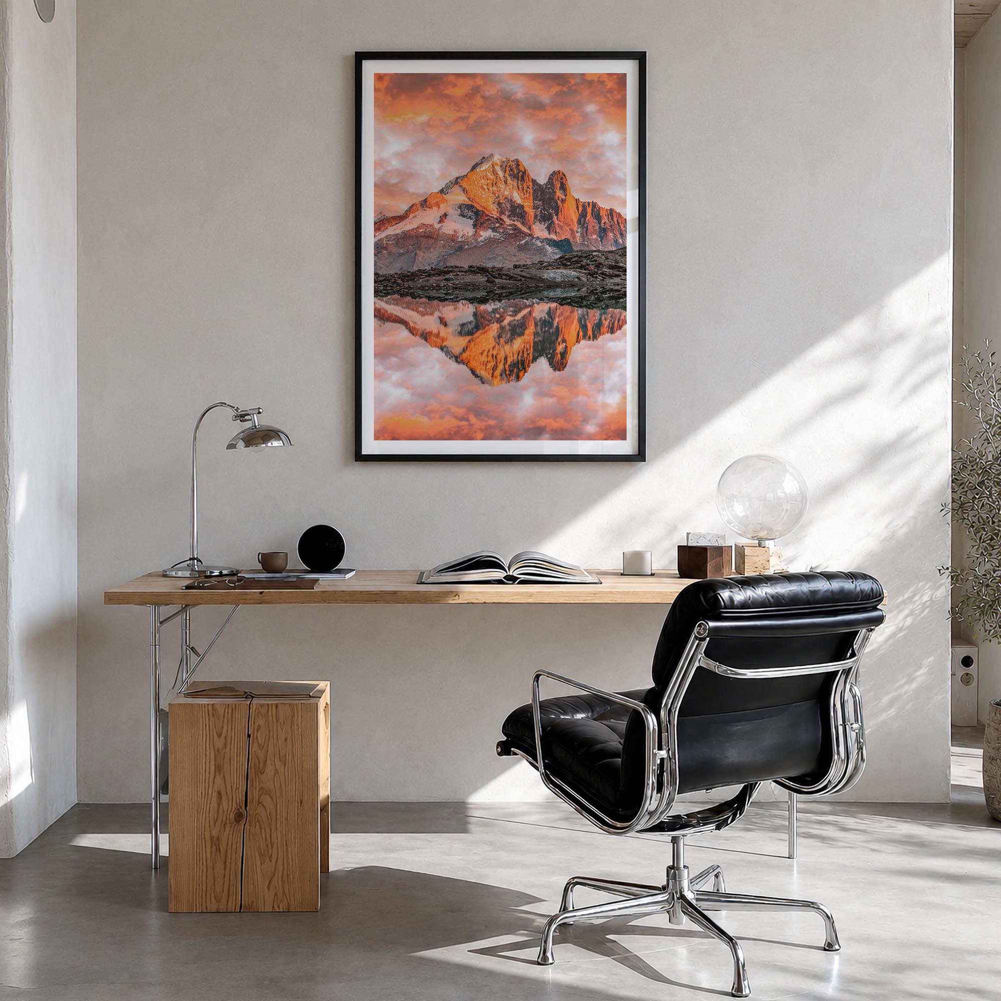 Chamonix colorful photo poster of France – vertical wall art in black wood frame with white border, hanging on wall