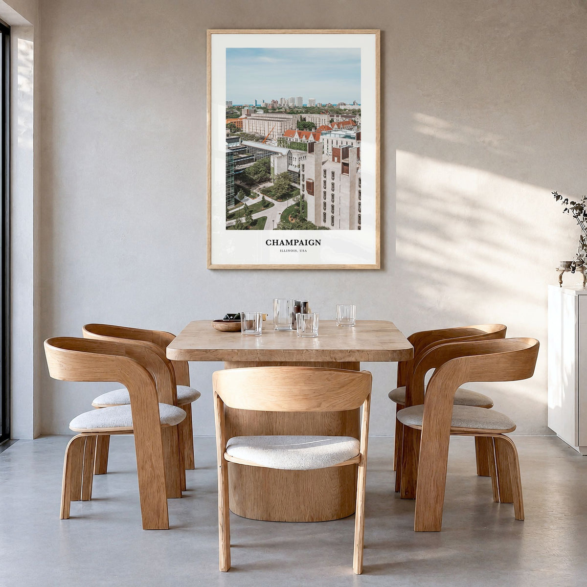 Champaign Classic Poster in a natural wood frame, hanging in a dining room