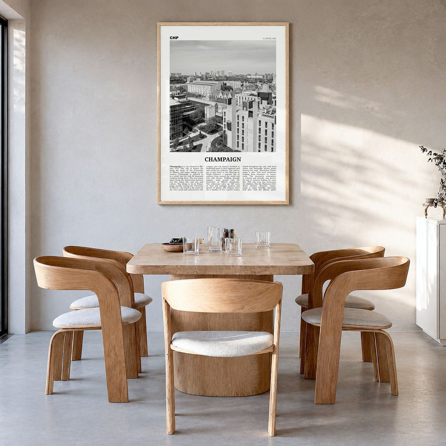 Champaign Newspaper Poster in a natural wood frame, hanging in a dining room