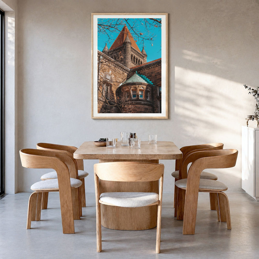 Champaign-Urbana Photo Poster in a natural wood frame, hanging in a dining room, white border