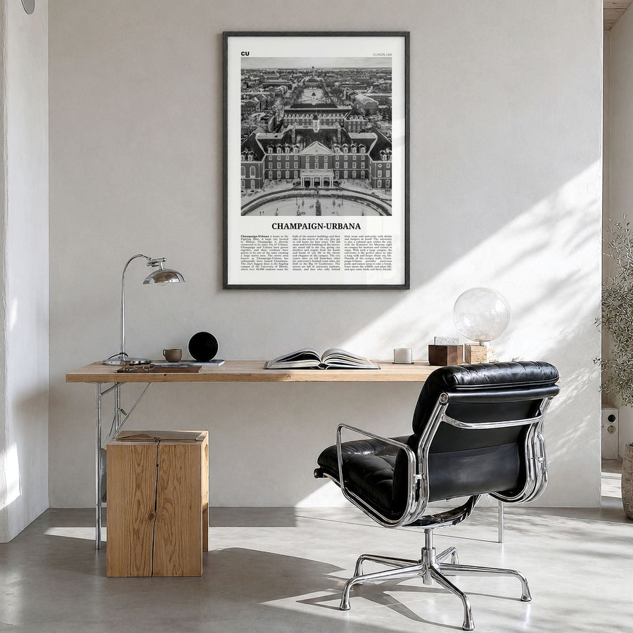Champaign-Urbana Newspaper Poster in a black wood frame, hanging in a bright home office