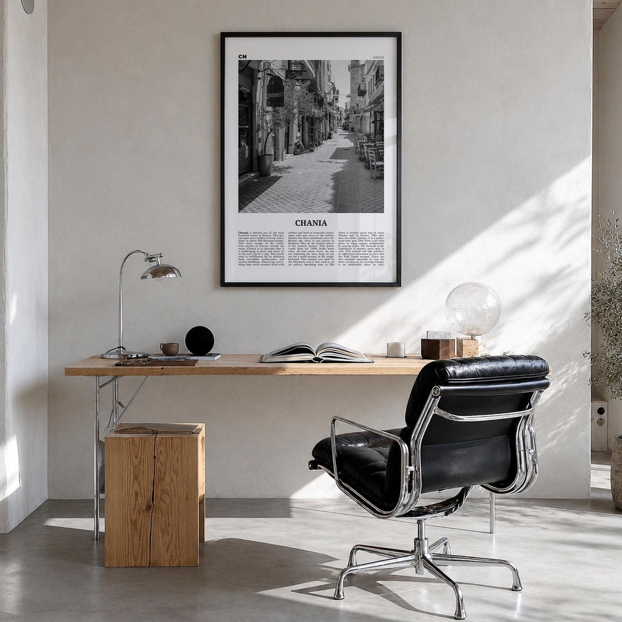 Chania black & white newspaper poster of Greece – vertical wall art in black wood frame, hanging on wall