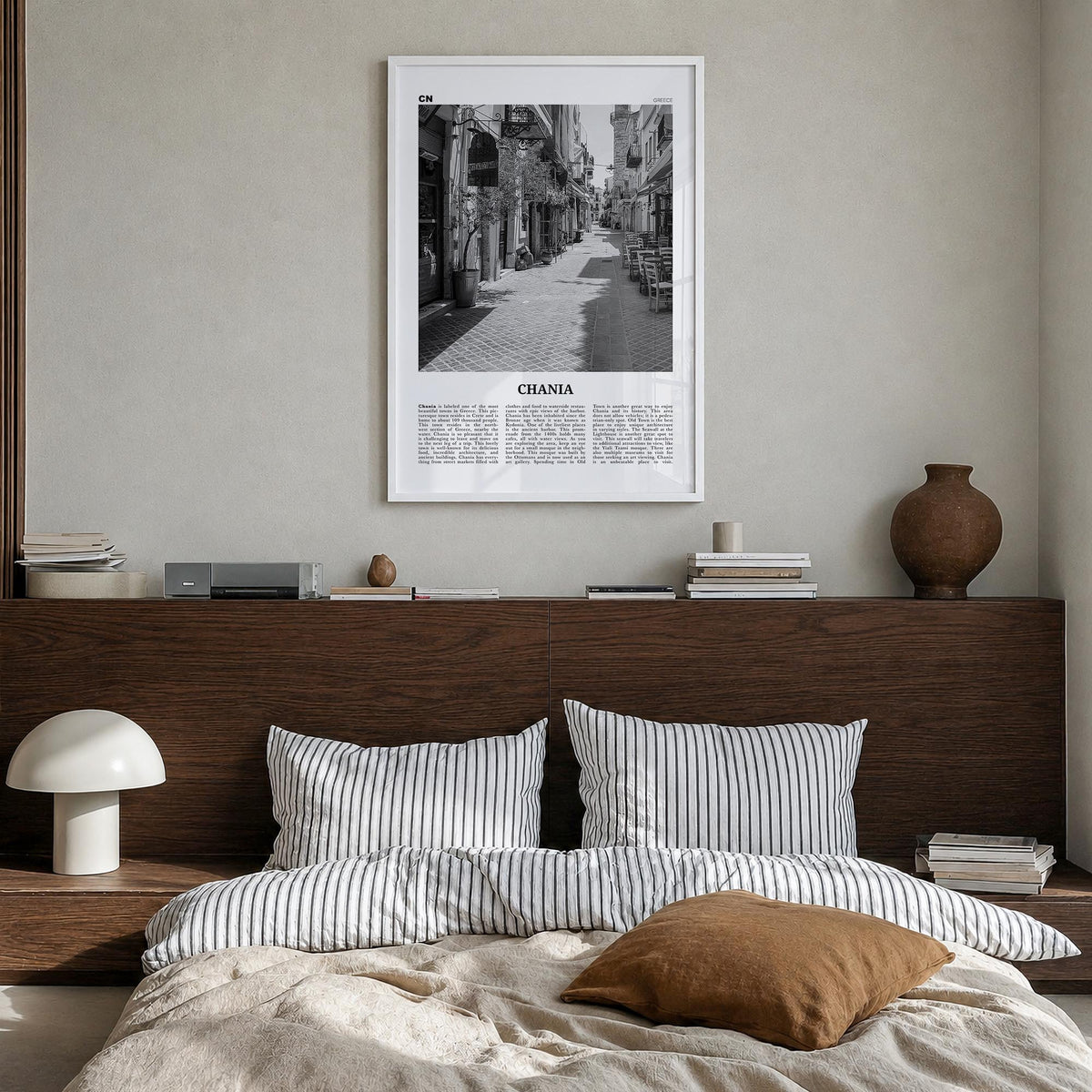 Chania black & white newspaper poster of Greece – vertical wall art in white wood frame, hanging on wall