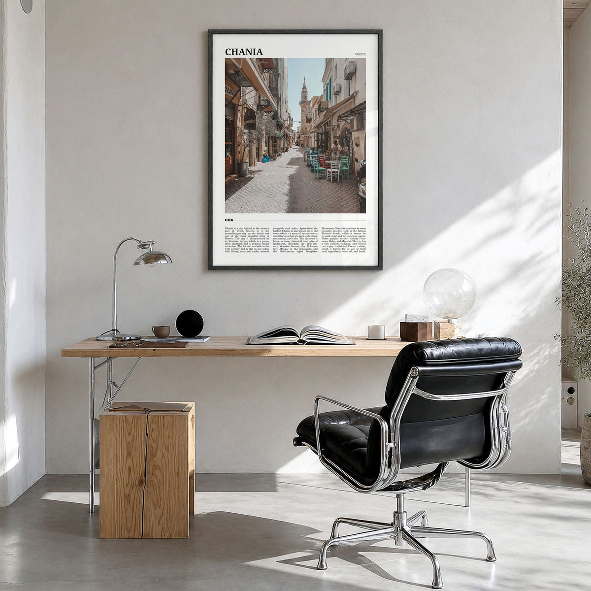 Chania Travel Poster in a black wood frame, hanging in a bright home office