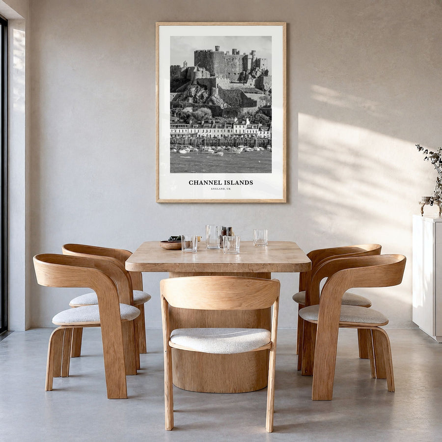 Channel Islands, England Classic Poster in a natural wood frame, hanging in a dining room