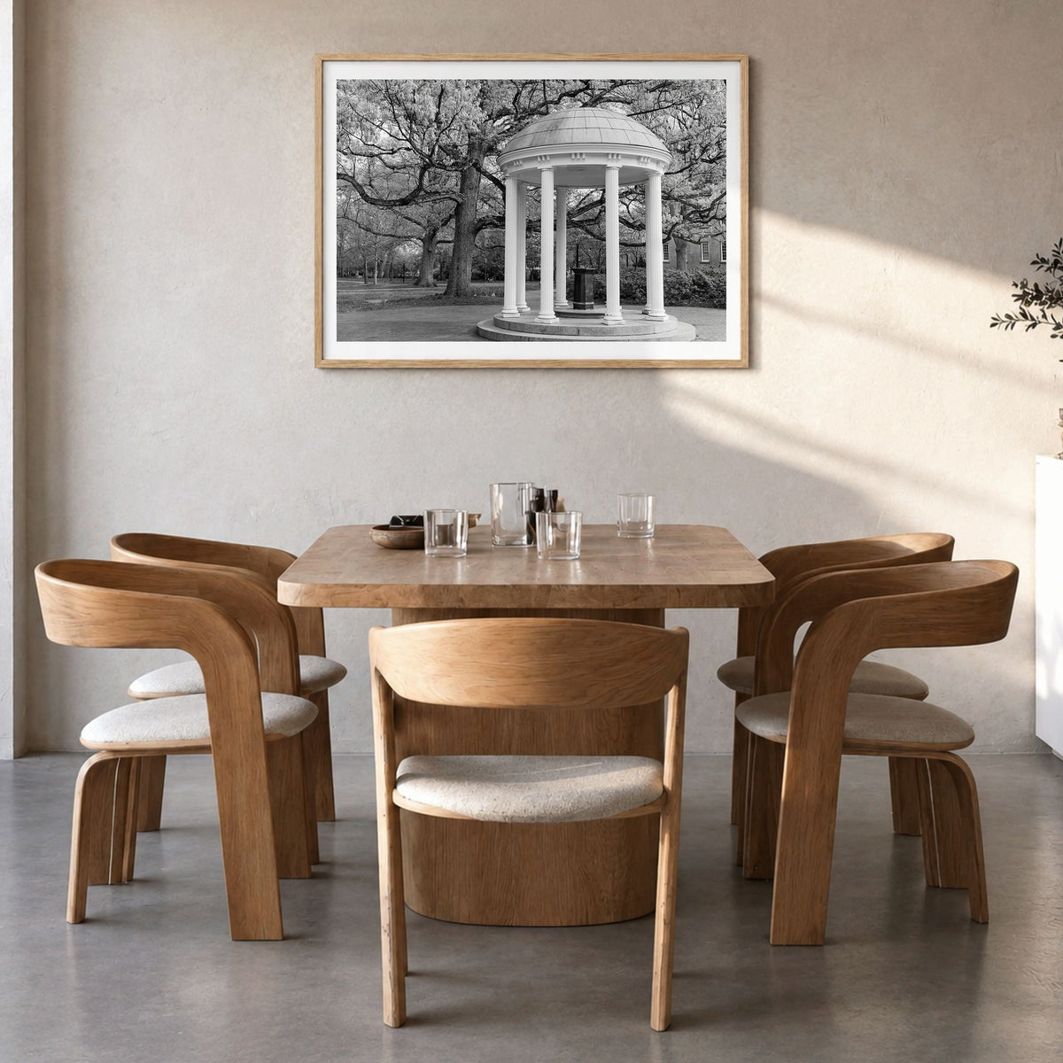 Chapel Hill Photo Poster in a natural wood frame, hanging in a dining room, white border