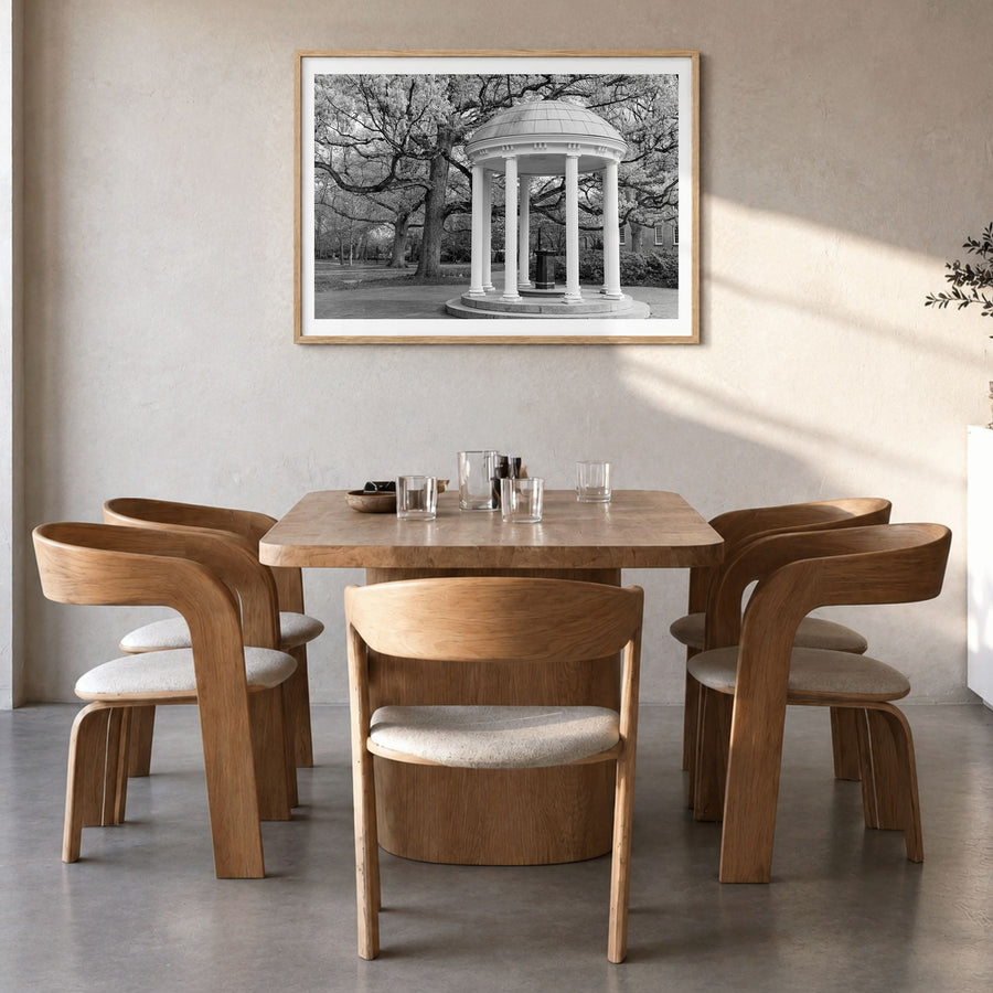 Chapel Hill Photo Poster in a natural wood frame, hanging in a dining room, white border