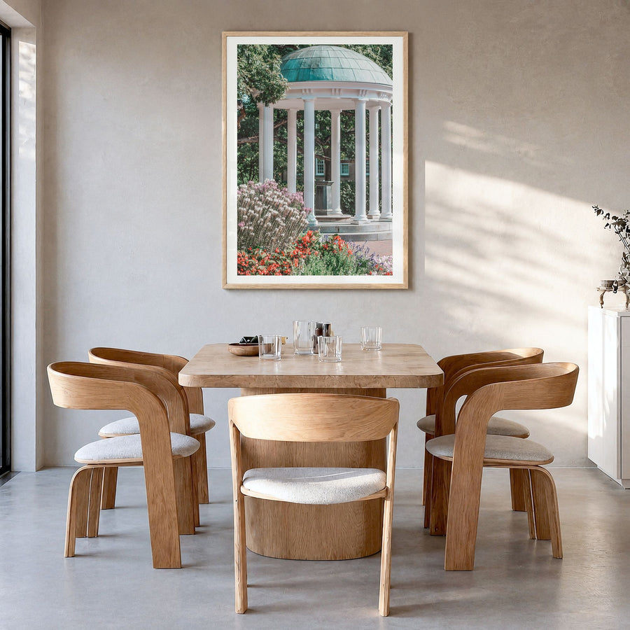Chapel Hill Photo Poster in a natural wood frame, hanging in a dining room, white border