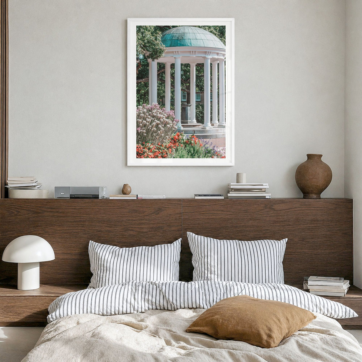 Chapel Hill Photo Poster in a white wood frame, hanging in a bedroom, white border