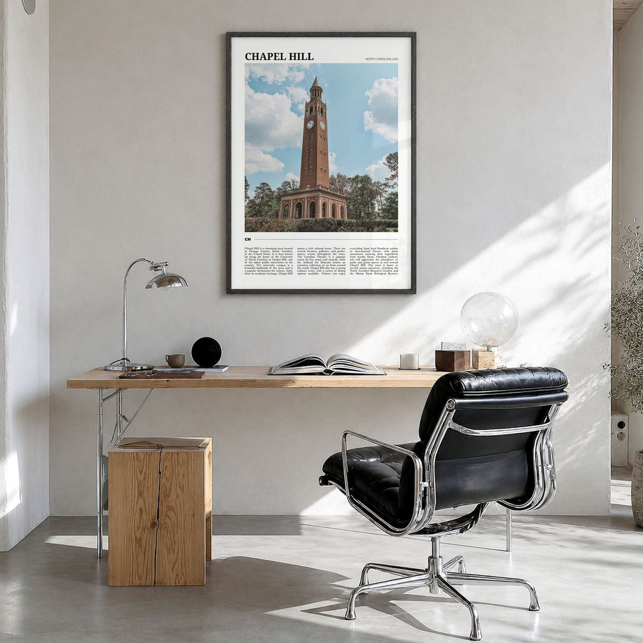Chapel Hill Travel Poster in a black wood frame, hanging in a bright home office