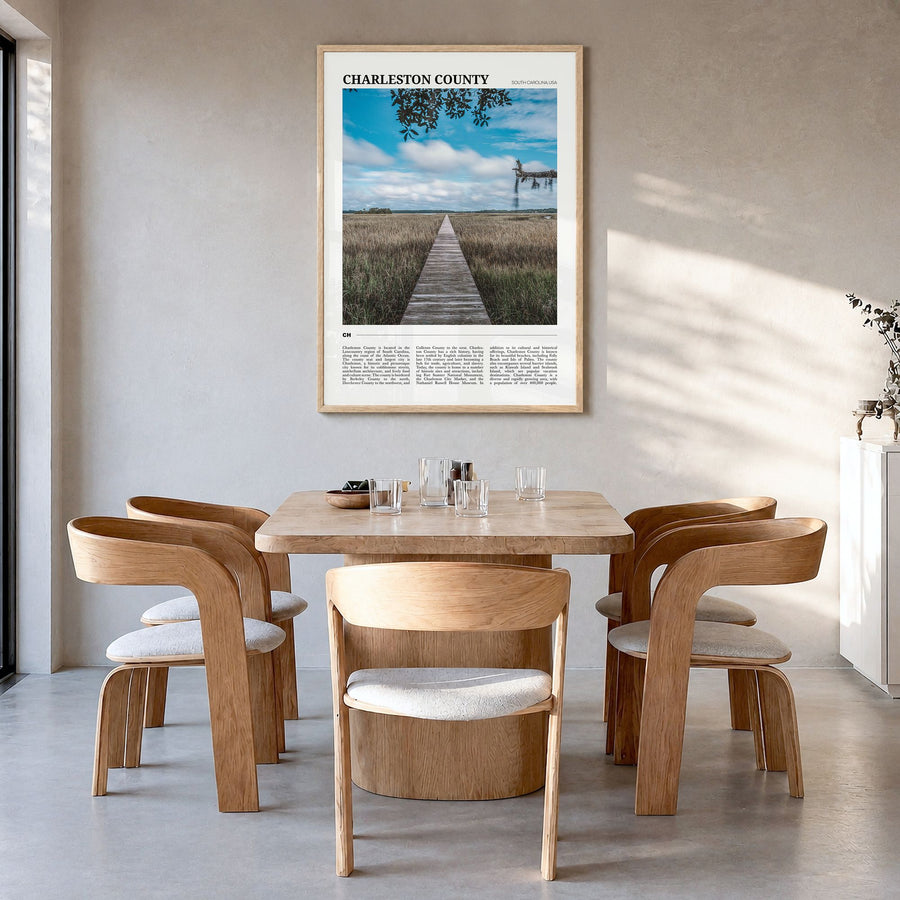 Charleston County Travel Poster in a natural wood frame, hanging in a dining room