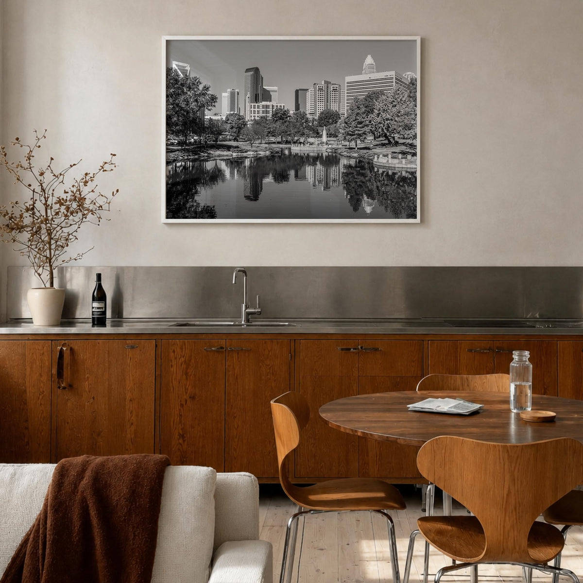 Charlotte black & white photo poster of North Carolina, USA – horizontal wall art in white wood frame, hanging on wall
