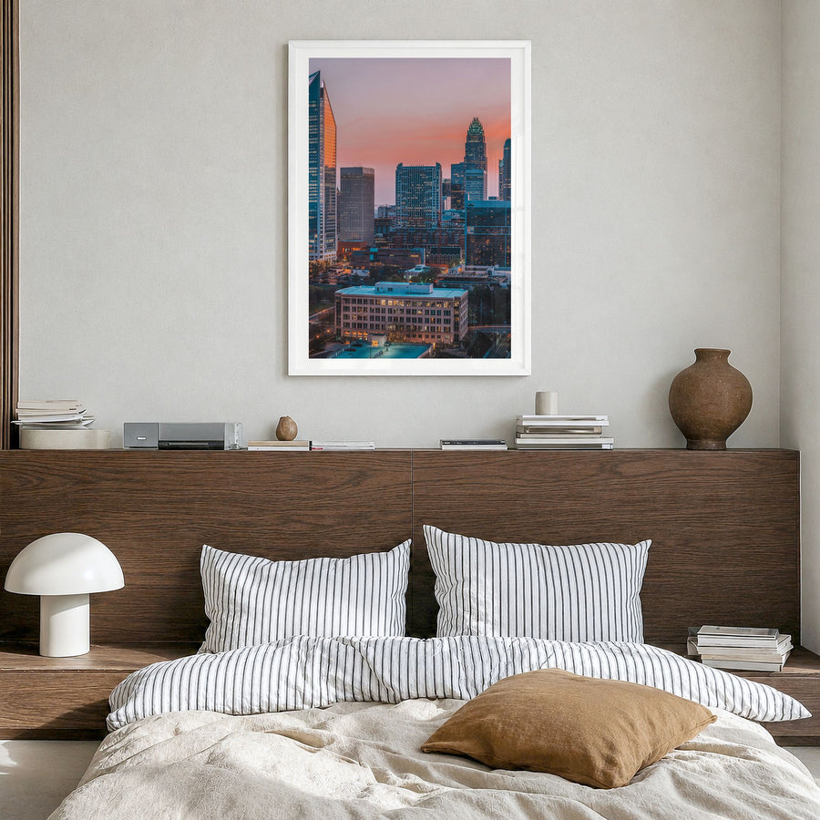 Charlotte Photo No 2 Poster in a white wood frame, hanging in a bedroom, white border