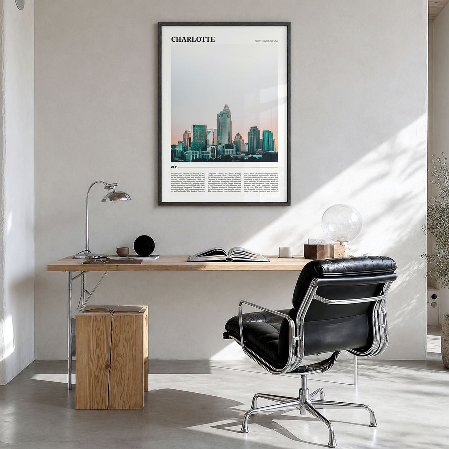 Charlotte Travel No 2 Poster in a black wood frame, hanging in a bright home office