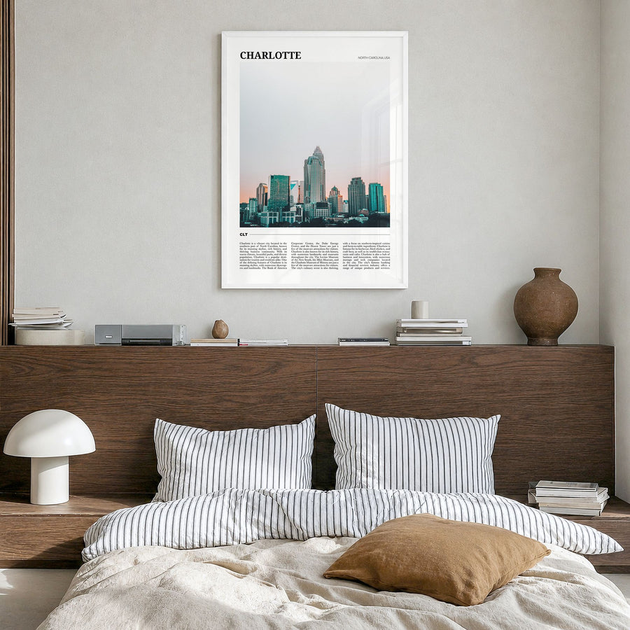 Charlotte Travel No 2 Poster in a white wood frame, hanging in a bedroom