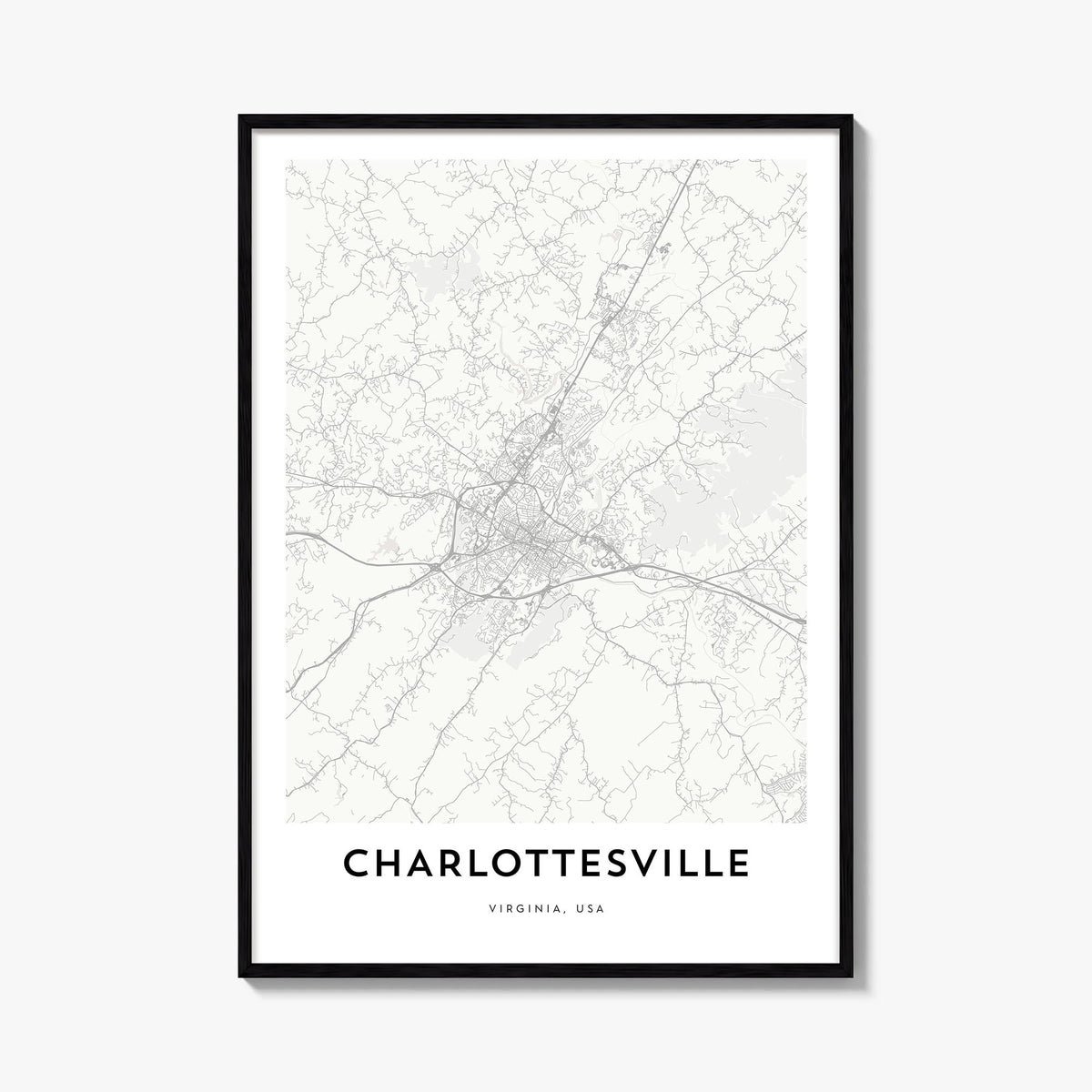 Charlottesville black & white map poster of Virginia, USA – vertical wall art, unframed print shown in interior mockup
