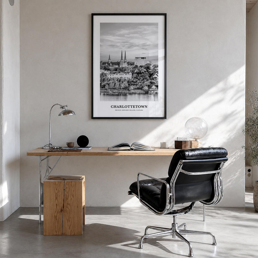 Charlottetown black & white classic poster of Canada – vertical wall art in black wood frame, hanging on wall