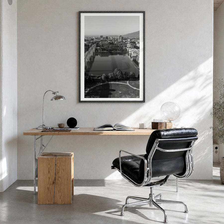 Chattanooga Photo Poster in a black wood frame, hanging in a bright home office, white border