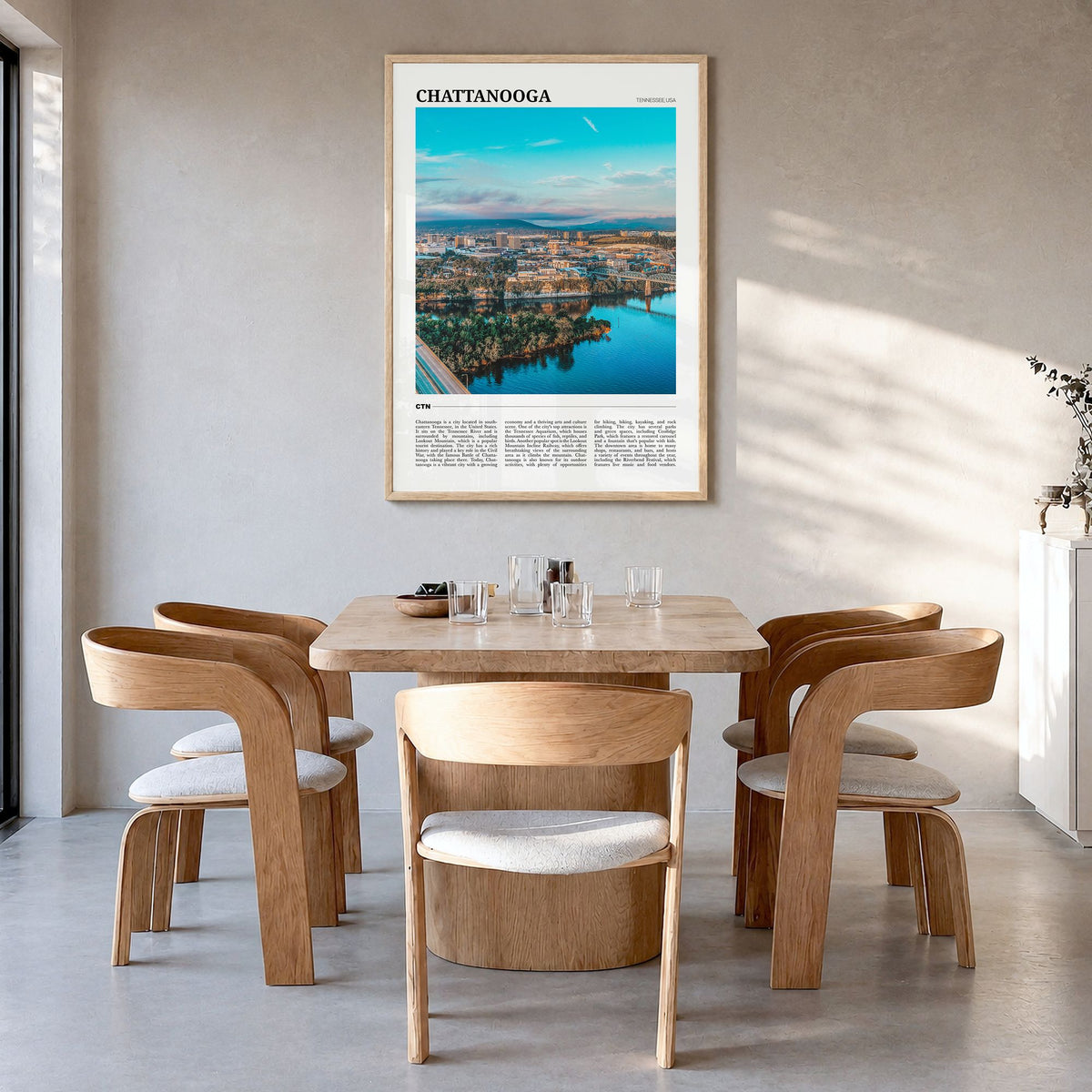 Chattanooga Travel Poster in a natural wood frame, hanging in a dining room