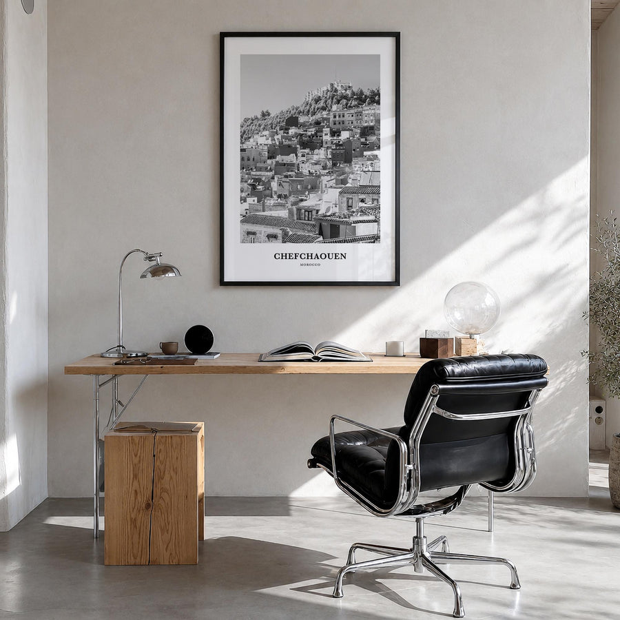 Chefchaouen black & white classic poster of Morocco – vertical wall art in black wood frame, hanging on wall
