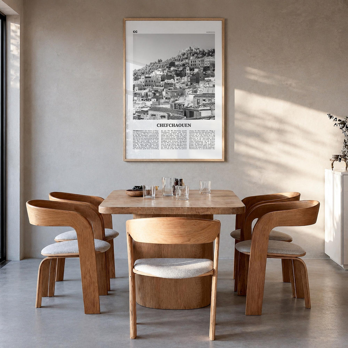 Chefchaouen black & white newspaper poster of Morocco – vertical wall art in natural wood frame, hanging on wall