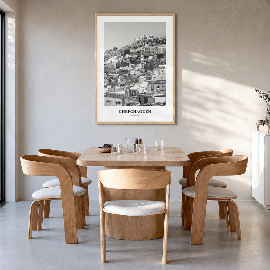 Chefchaouen Classic Poster in a natural wood frame, hanging in a dining room