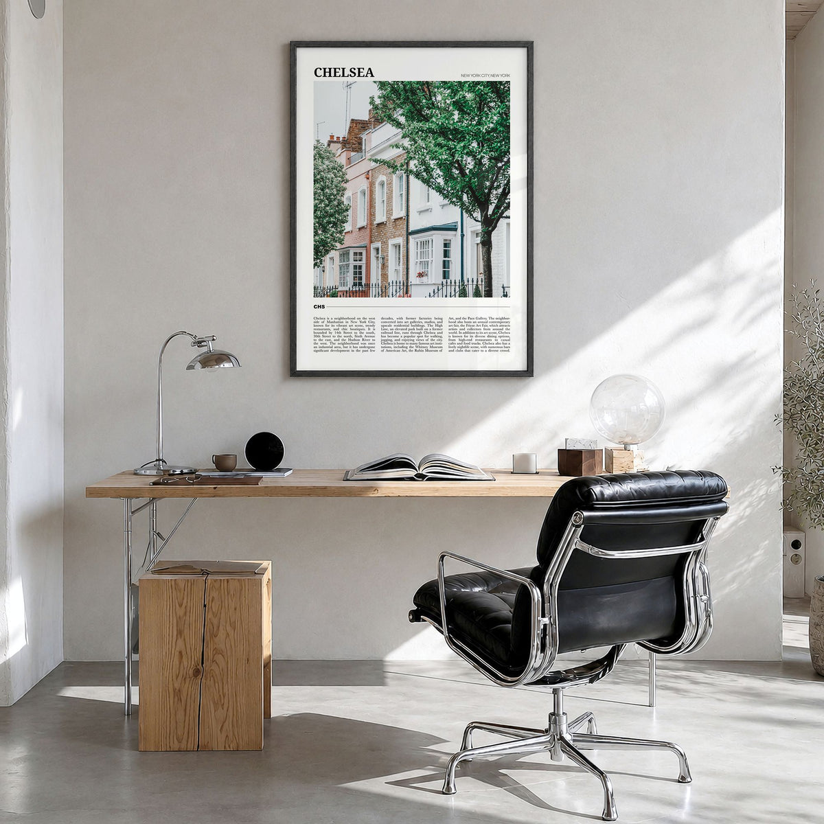 Chelsea, New York Travel Poster in a black wood frame, hanging in a bright home office