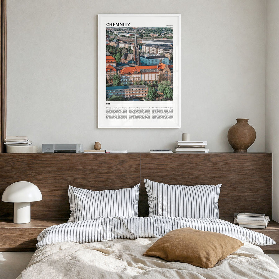 Chemnitz Travel Poster in a white wood frame, hanging in a bedroom