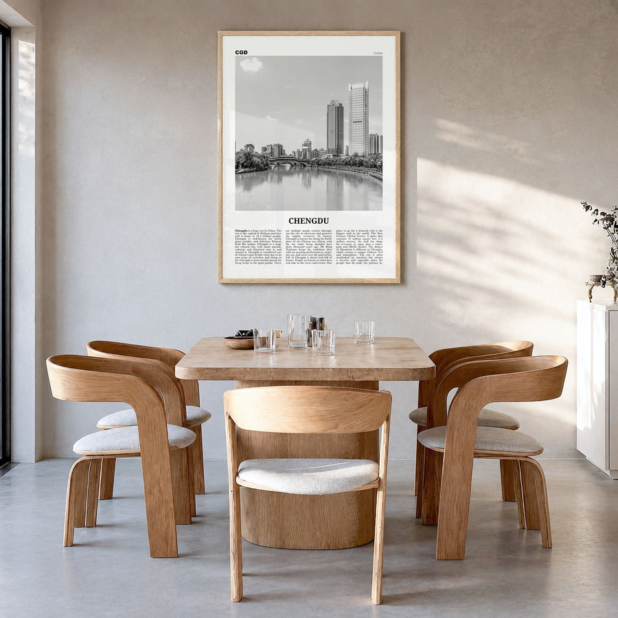 Chengdu Newspaper Poster in a natural wood frame, hanging in a dining room