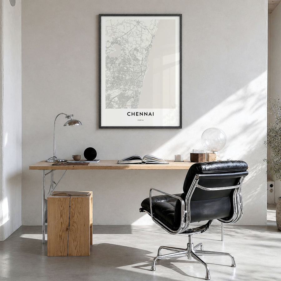 Chennai Map Poster in a black wood frame, hanging in a bright home office