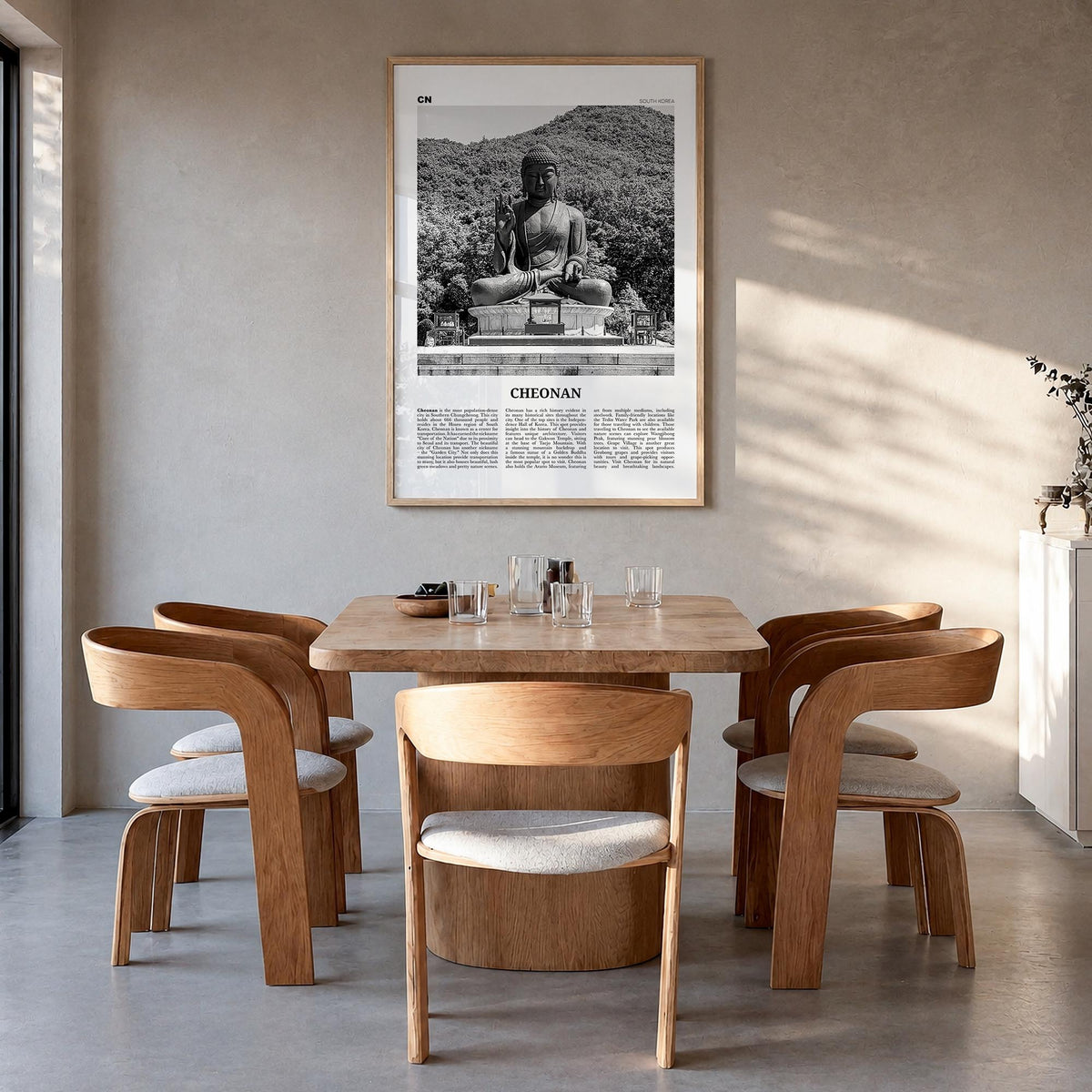 Cheonan black & white newspaper poster of South Korea – vertical wall art in natural wood frame, hanging on wall